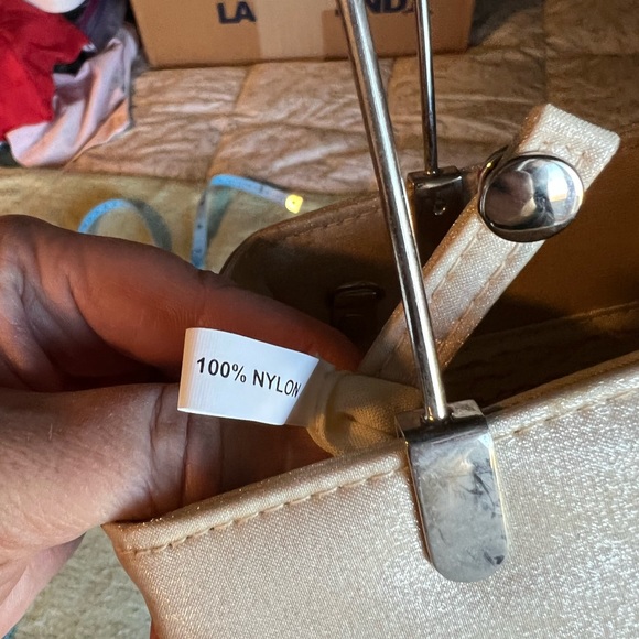 Soft champagne colored cocktail handbag with metal hardware - Picture 12 of 12